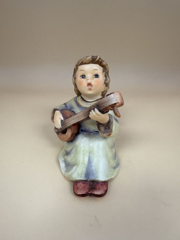 Figurine. German. Hummel. #438 &quot;Sounds of the Mandolin&quot;. TMK 7 (1991-2000). 3.25&quot;H