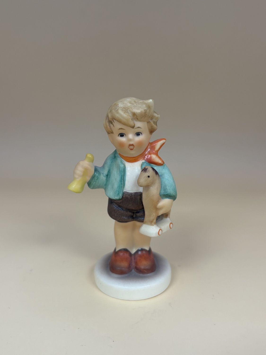 Figurine. German. Hummel. #239/C &quot;Boy with Horse&quot; TMK 7 (1991-2000). 3.25&quot;H