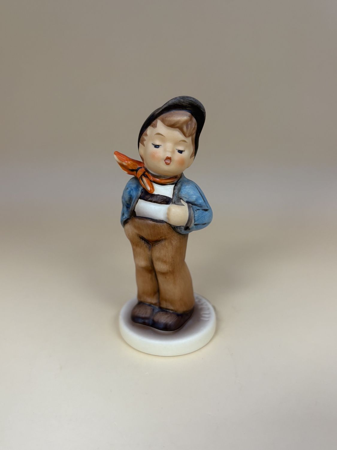 Figurine. German. Hummel. #560 &quot;Lucky Fellow&quot;. TMK 7 (1991-2000). 3.5&quot;H