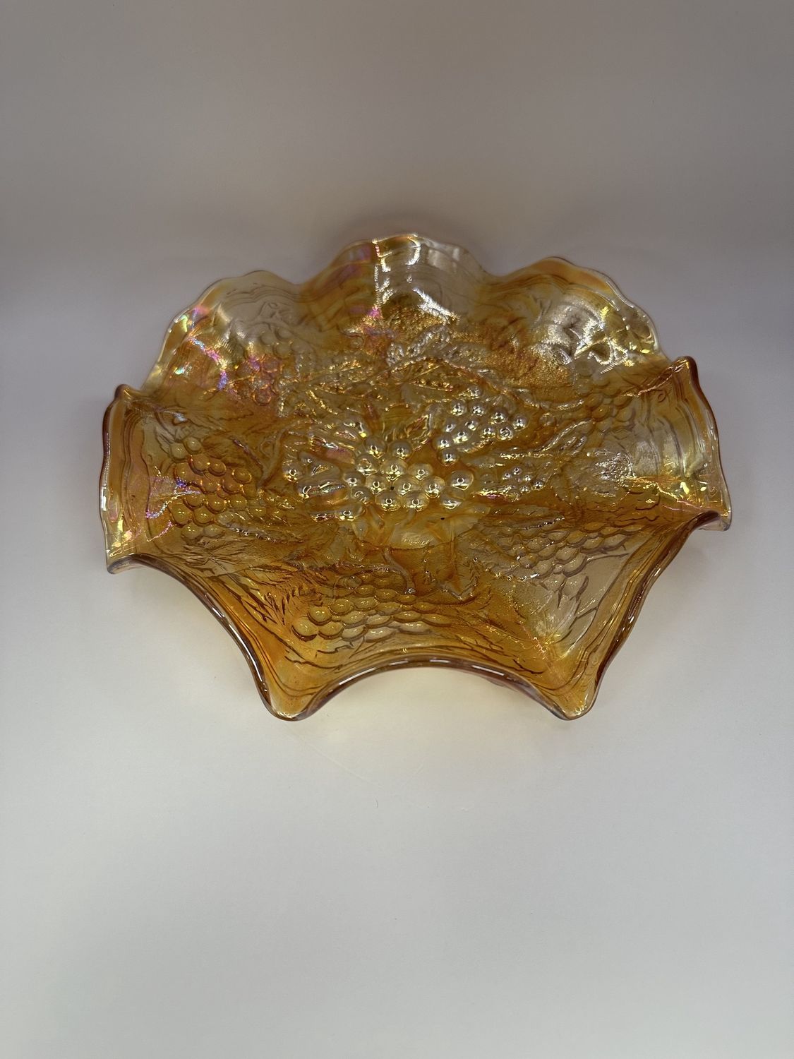Glass. USA. Imperial Carnival Glass. Dish with Base. Grape and Leaves Pattern. Marigold. 8.5&quot;W