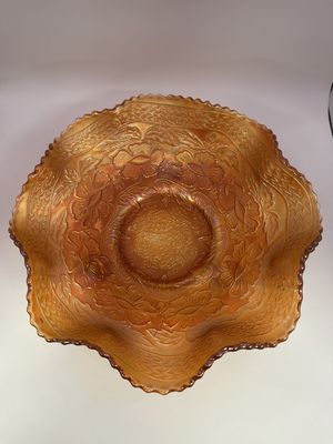 Glass. USA. Fenton. Carnival Glass. Footed Bowl with Floral Pattern and Ruffled Edge. Marigold. 9.75"W