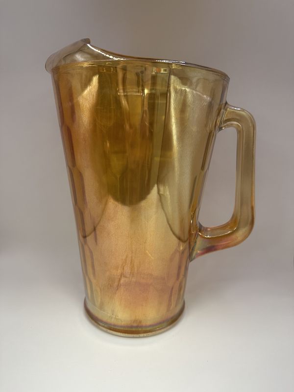 Glass. USA. Jeanette. Carnival Glass Pitcher. &quot;Honeycomb&quot; Pattern. Marigold. 10&quot;H