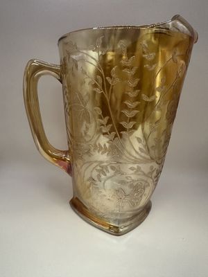 Glass. USA. Jeanette. Carnival Glass Pitcher w/Floral Pattern. "Floragold". 9.5"H