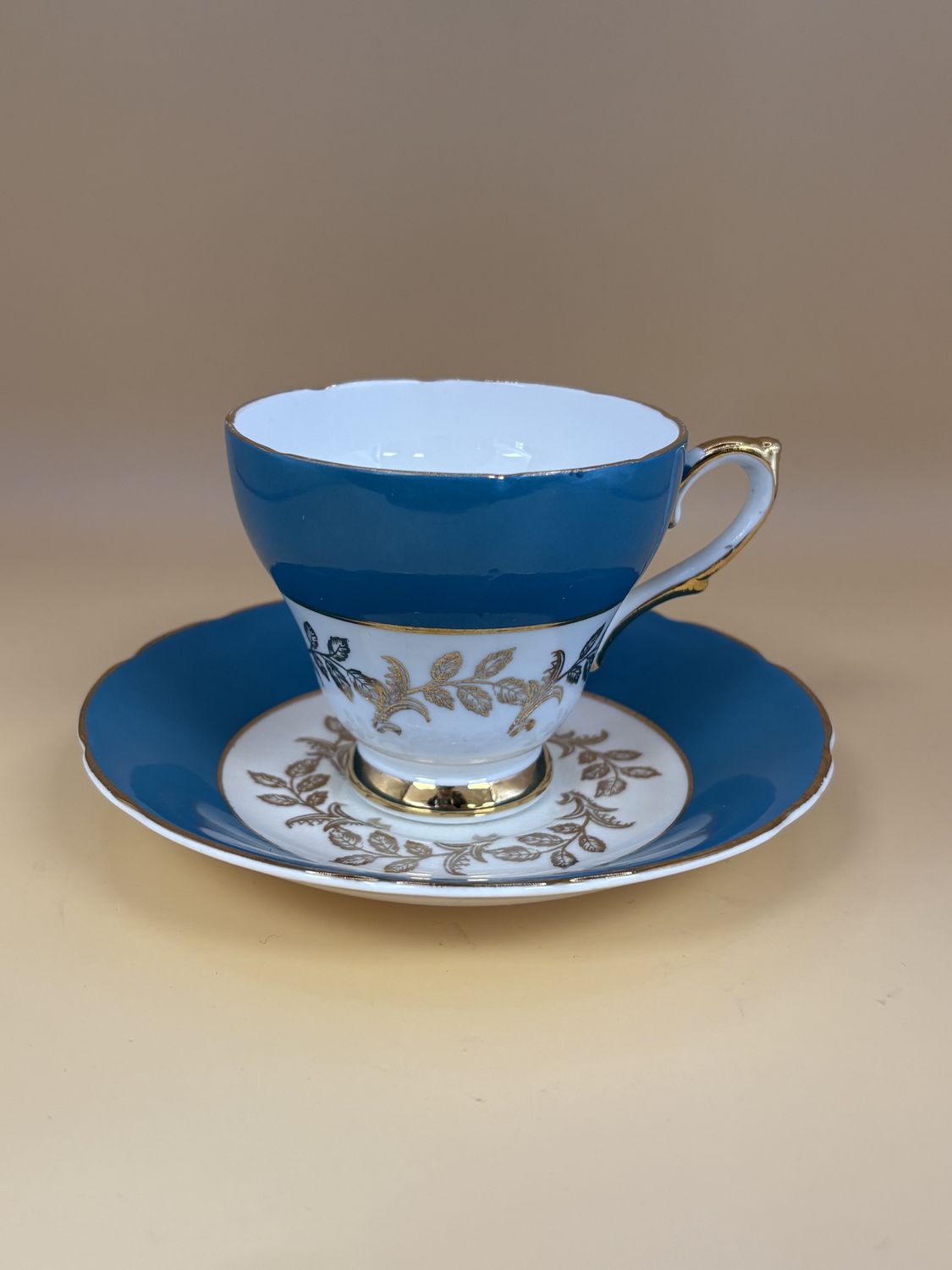 Porcelain. England. Sutherland. Teacup and Saucer. Teal and White with Gold Trim. 3.25&quot;H