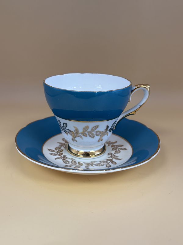 Porcelain. England. Sutherland. Teacup and Saucer. Teal and White with Gold Trim. 3.25&quot;H