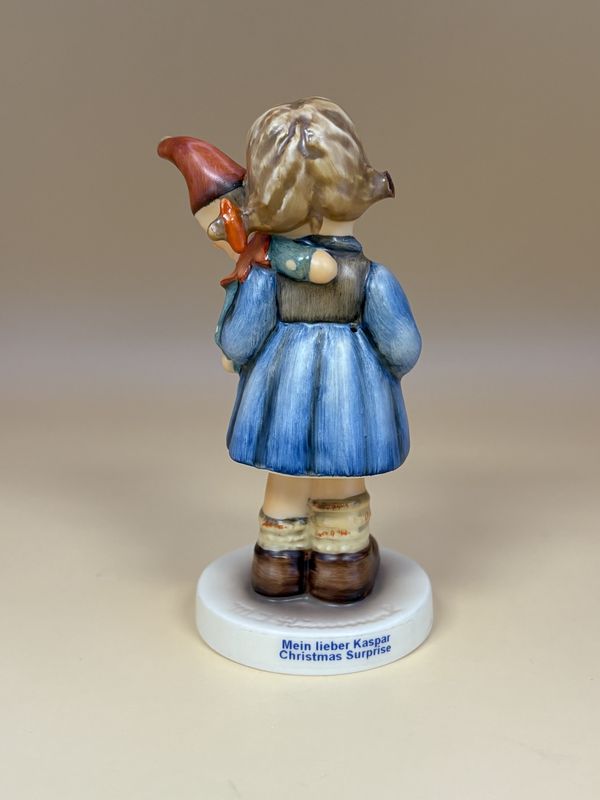 Figurine. Germany. Hummel. #536 3/10. "Christmas Surprise" w/Box. TMK 7 (1991-2000). 4"H