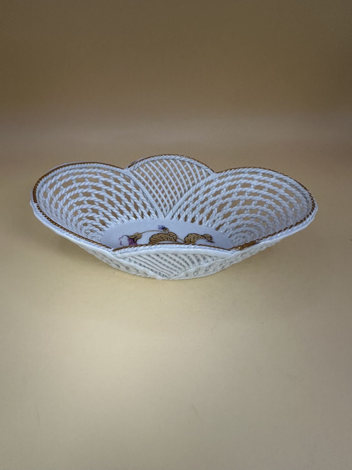 Porcelain. Romania. Cluj Napoca. Dish. Oval, Basketwork Sides. Pink &amp; Purple Flower on Bottom w/ Gold Leaves. 6&quot;W