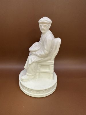 Figurine. Ireland. Belleek. Basket Maker. 5.25"H