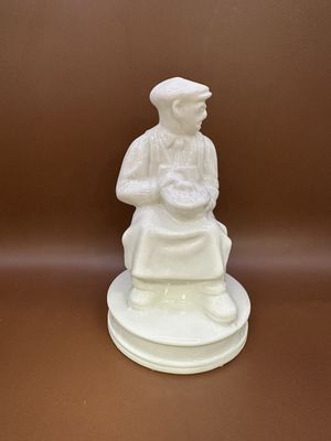 Figurine. Ireland. Belleek. Basket Maker. 5.25"H