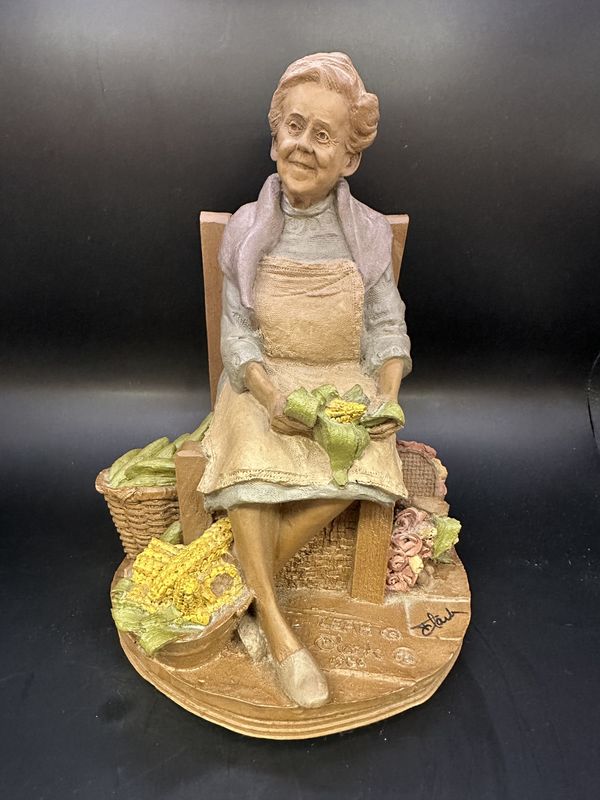 Sculpted Figure. USA. Tom Clark. Signed. Leah. Woman in Blue Dress Sitting in Wooden Chair &amp; Shucking Corn. 1986. 8.75&quot;H