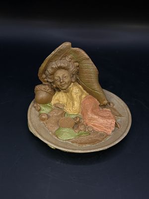 Sculpted Figure. USA. Tom Clark. Colette. Woman in Yellow Top &amp; Red Skirt Lying under a Leaf. 1984. 2.5"H