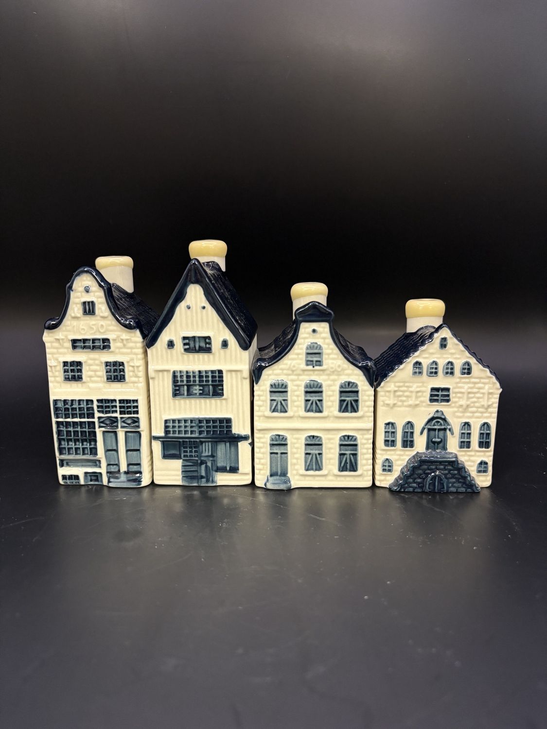 Porcelain. Netherlands. KLM Houses. Blue Delft. Set of Four. 4&quot;H