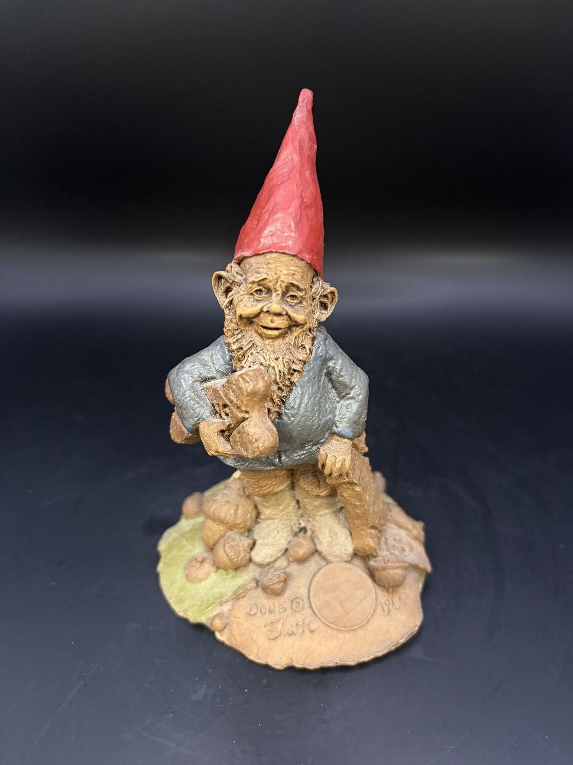 Sculpted Figure. USA. Tom Clark. Doug. Gnome Carrying a Dog Biscuit. 1989. 5.75&quot;H