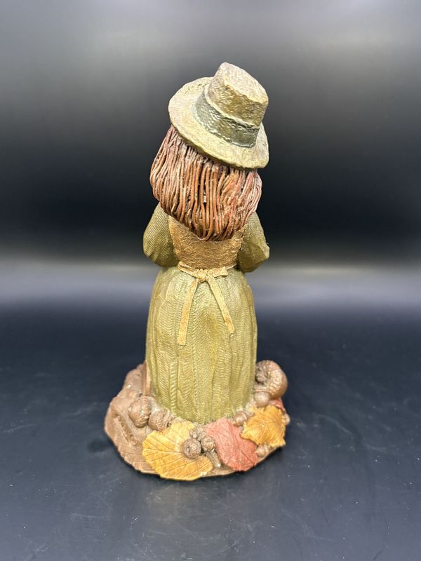 Sculpted Figure. USA. Tom Clark. Erin Go Bragh. Female Irish Leprechaun Holding Clovers in Her Apron. 1991. 6"H