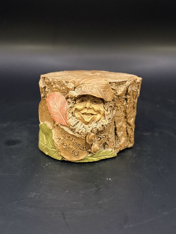 Sculpted Figure. USA. Tom Clark. Riser 3. Tree stump with gnome face (brown hat) and leaves on side. 1985. 2&quot;H