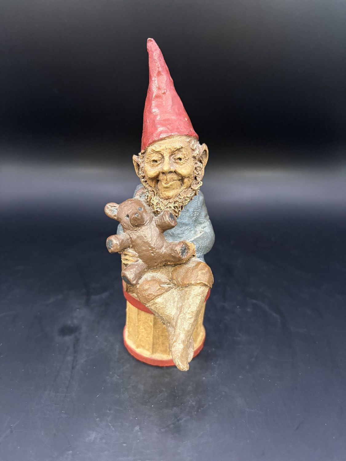 Sculpted Figure. USA. Tom Clark. Teddy. Gnome Sitting on a Drum &amp; Holding a Teddy Bear. 1983. 5.75&quot;H