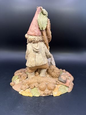 Sculpted Figure. USA. Tom Clark. Sugar &amp; Spice. Signed. Woman Sitting Against Tree, w/Rose in Lap &amp; Gnome Behind Her (colored leaves). 1984. 6.5"H