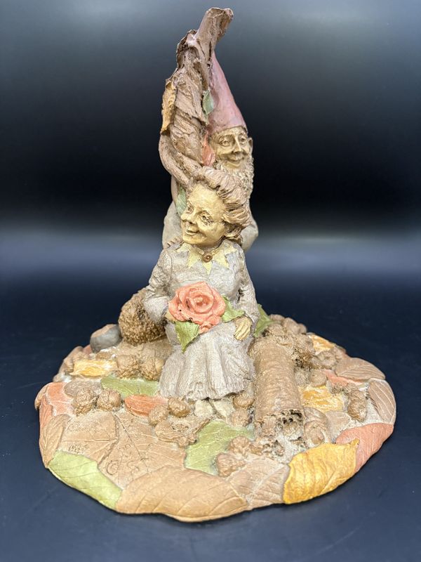 Sculpted Figure. USA. Tom Clark. Sugar &amp; Spice. Signed. Woman Sitting Against Tree, w/Rose in Lap &amp; Gnome Behind Her (colored leaves). 1984. 6.5&quot;H