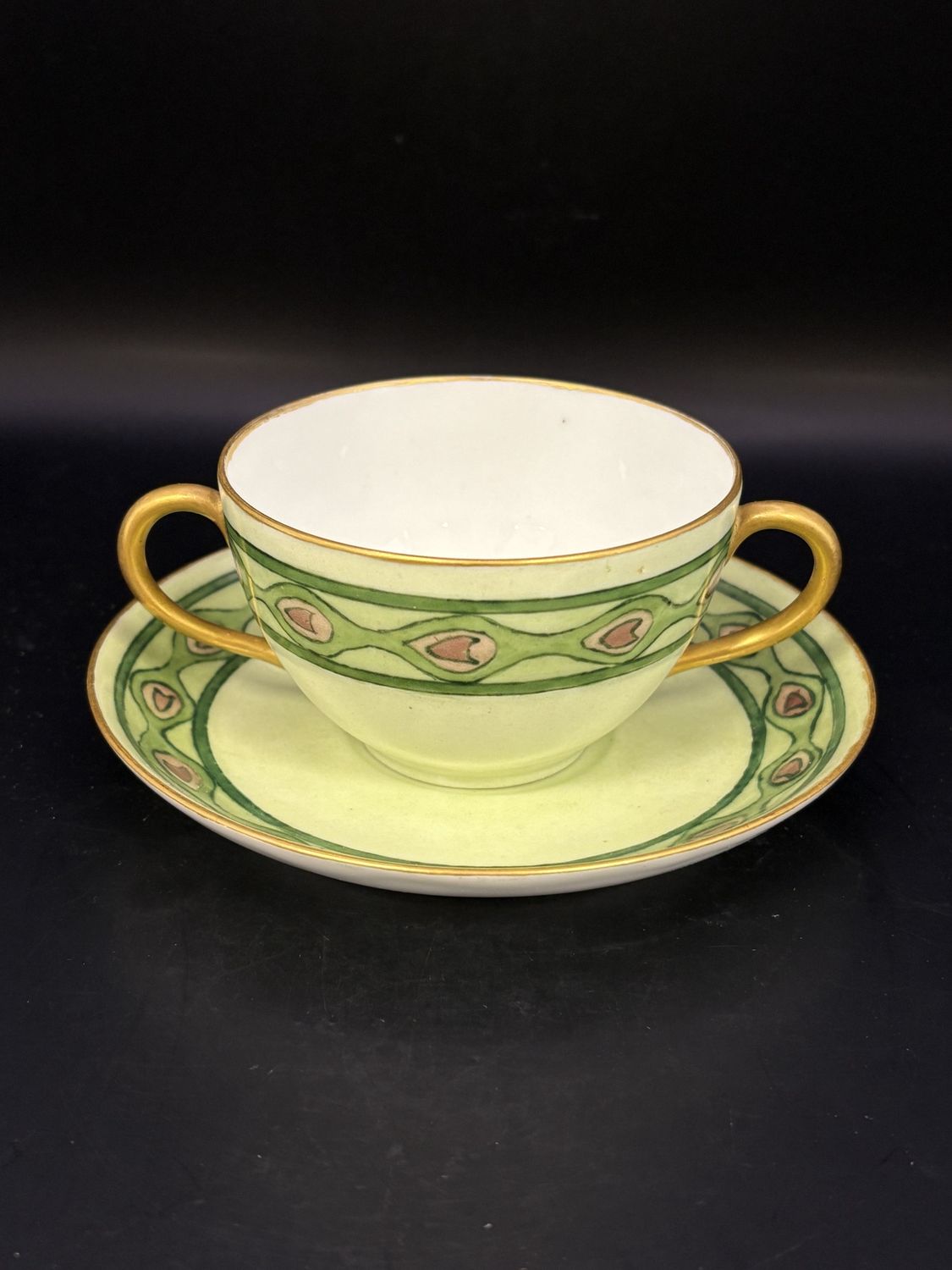 Porcelain. England. Two Handled Teacup and Saucer. Green. French.