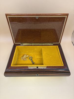 Jewelry/Music Box. Italy. Sorrento. Dark Brown w/Light Brown Flowers &amp; Trim. Glossy Finish. Gold Velveteen Interior. Plays Arrivederci Roma. 8"W