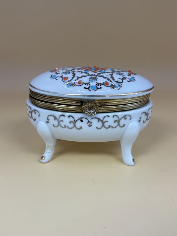 Porcelain. Germany. Kalk. 4-Legged Oval Trinket Box w/Brass Trim. White with Blue &amp; Orange Detailing (1955-1960). 3.5&quot;W
