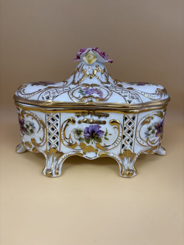 Porcelain. Germany. KPM. Trinket Box w/Lid. Purple &amp; Pink Flowers w/ Gold Rim.  7.5&#39;&#39;L x 4.5&#39;&#39;H.