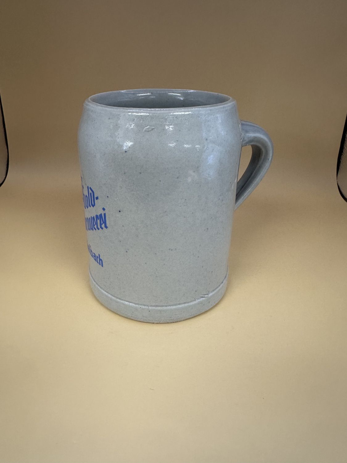 Stein. Germany. Gold-Ochsen-Braurei. Gray w/ Blue Lettering. 5&quot;H
