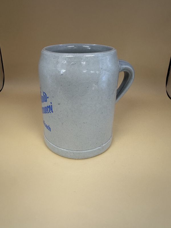 Stein. Germany. Gold-Ochsen-Braurei. Gray w/ Blue Lettering. 5&quot;H
