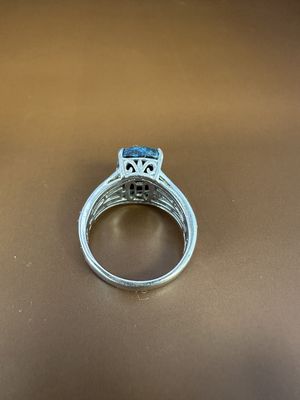 Jewelry. Ring. Sterling Silver Band w/Cushion Cut Chrysocolla Stone, Flanked by 12 Petite Tanzanites in a Filigree Setting. Size 9.5