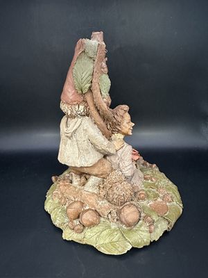 Sculpted Figure. USA. Tom Clark. Sugar &amp; Spice. Woman Sitting Against Tree, w/Rose in Lap &amp; Gnome Behind Her (green leaves). 1984. 6.5"H