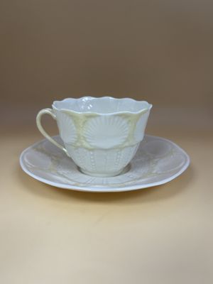 Porcelain. Ireland. Belleek. Luster Pearl Yellow Shell Pattern Teacup and Saucer. 2 pcs. [6th Mark/Green: 1965-1980]. 2.75"H