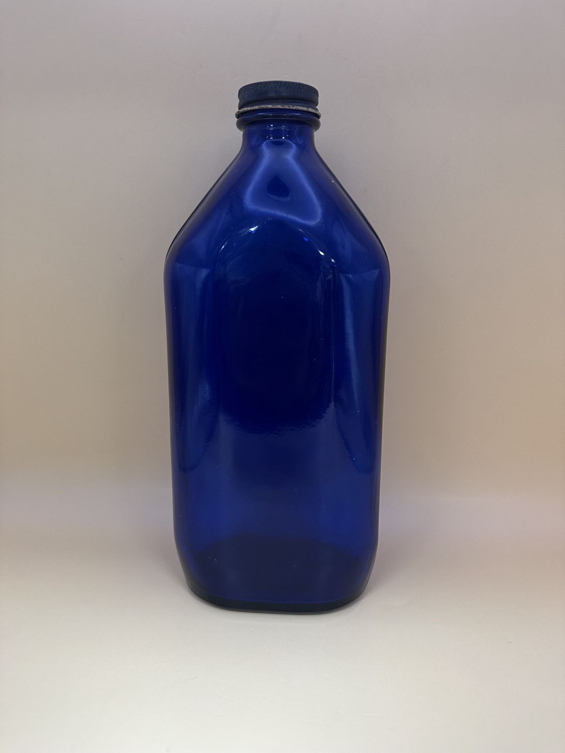 Glass. USA. Phillips Milk of Magnesia Cobalt Blue Bottle w/Lid. Late 1960s. 8.75&quot;H