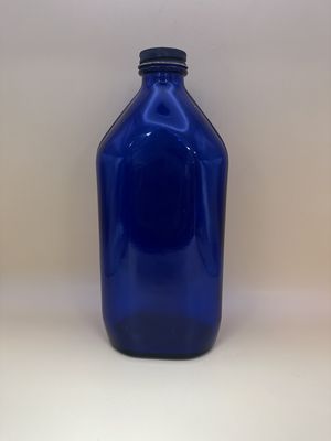 Glass. USA. Phillips Milk of Magnesia Cobalt Blue Bottle w/Lid. Late 1960s. 8.75"H