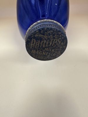 Glass. USA. Phillips Milk of Magnesia Cobalt Blue Bottle w/Lid. Late 1960s. 8.75"H