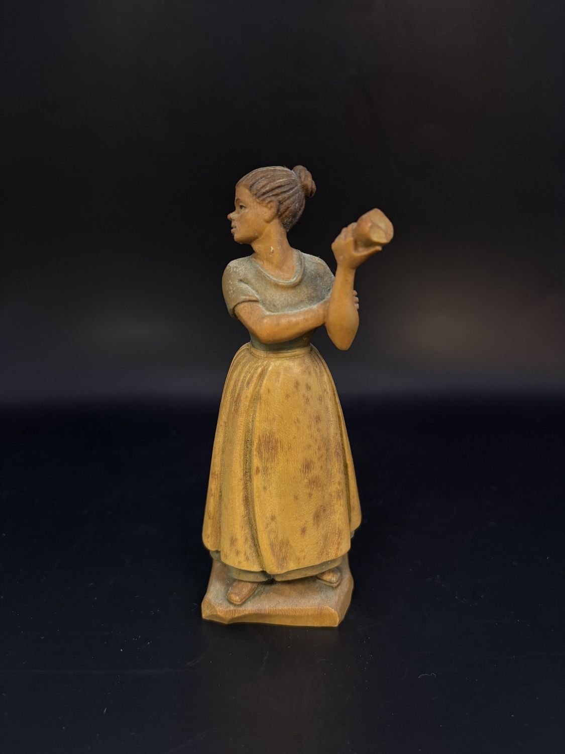 Figurine. Wood. Italy. Anri. Woman in Apron Holding Half-Eaten Apple. 5&quot;H