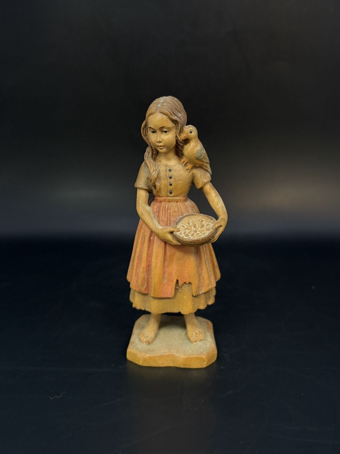 Figurine. Wood. Italy. Anri. Girl in Apron with Bird on Shoulder Holding Bowl. 5&quot;H
