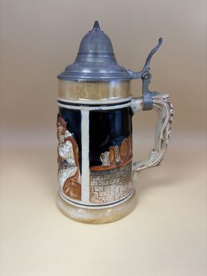 Stein. Germany. Three Men Drinking with Barrel Decoration on Sides and Pewter Lid. 7"H