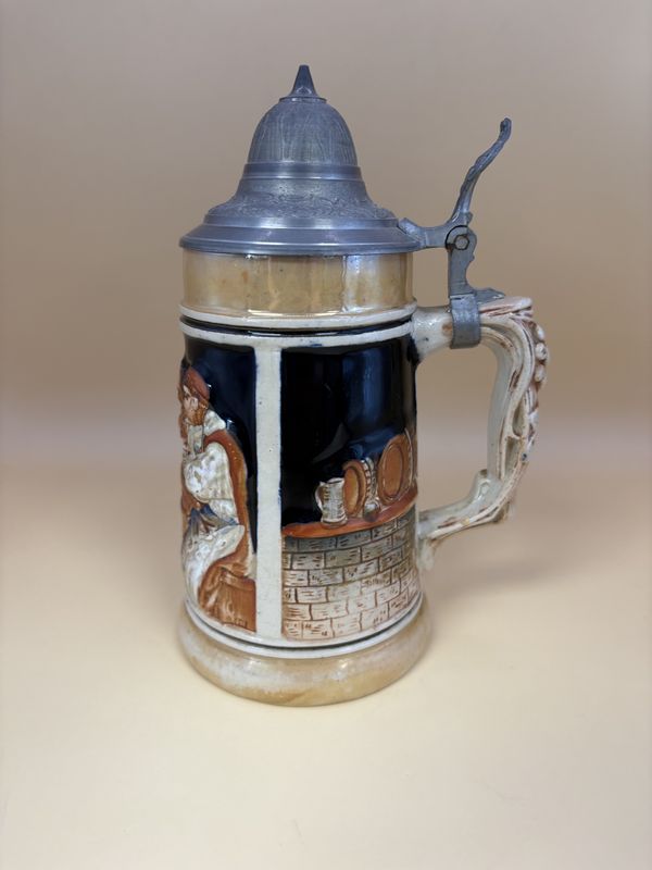 Stein. Germany. Three Men Drinking with Barrel Decoration on Sides and Pewter Lid. 7&quot;H