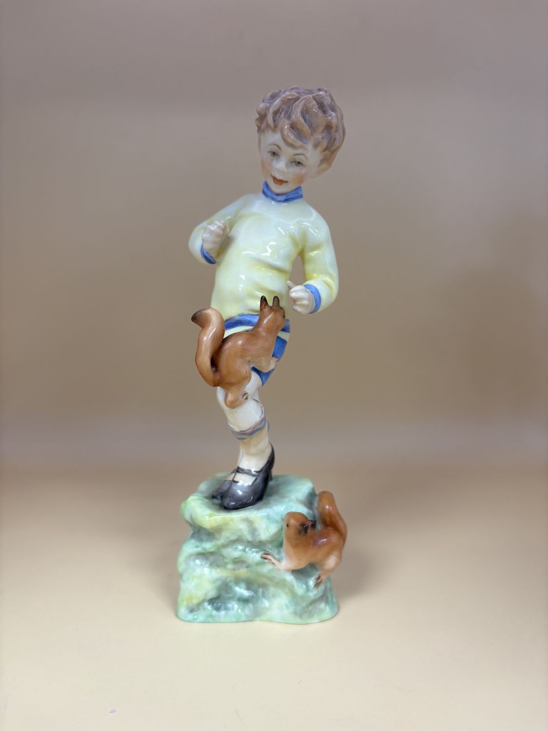 Figurine. England. Royal Worcester. &quot;October&quot; Boy of the Month. 7.5&quot;H