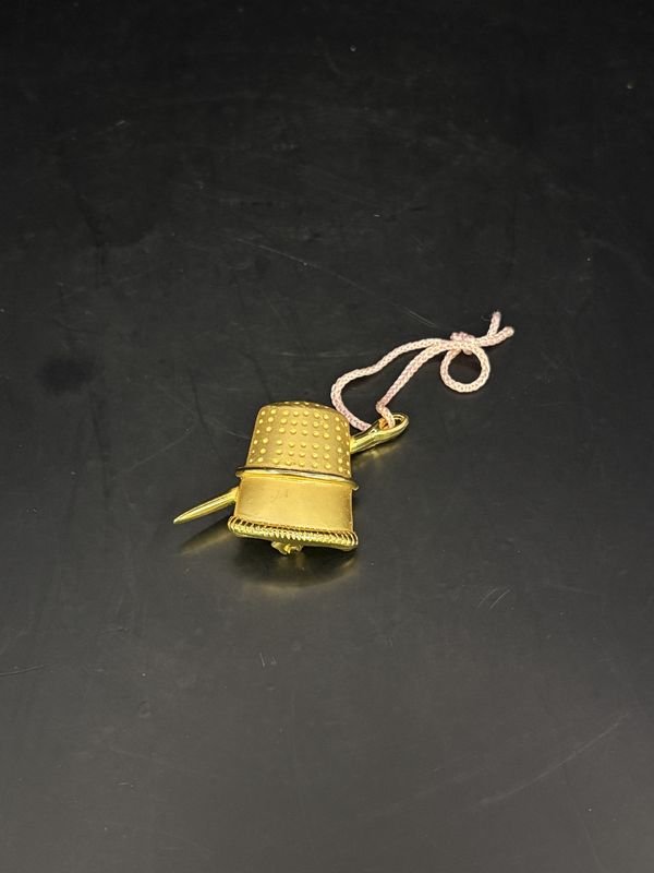 Jewelry. Pin. Gold Thimble and Needle w/ Pink String. 1&quot;H