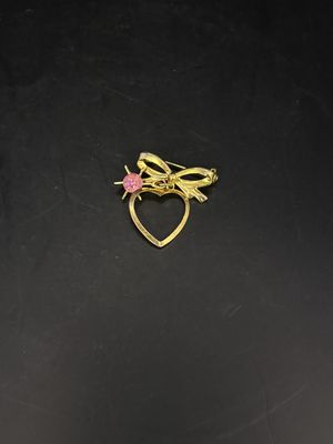 Jewelry. Pin. Gold Heart and Ribbon w/ Pink Rhinestone Hanging in Center. 1.25"h