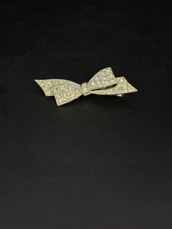 Jewelry. Pin. Silver Ribbon w/ Rhinestones. 2.25&quot;W
