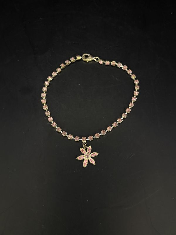 Jewelry. Necklace. Avon. Silver Tone Pink Rhinestone and Flower Charm Necklace. 4.5&quot;H