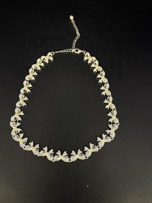 Jewelry. Necklace. Avon. Silver Tone Ribbon Charm Necklace w/ Faux Pearls. 7&quot;L