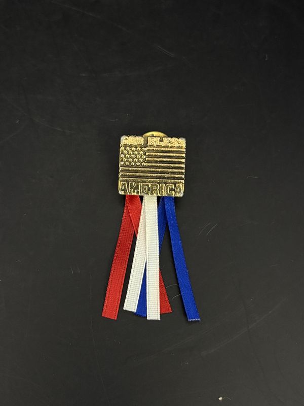 Jewelry. Pin. &quot;God Bless America&quot; Gold Tone Pin w/ Flag Engraved. Red White Blue Ribbons Attached. 2&quot;H