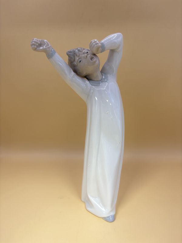 Figurine. Spain. Lladro. Yawning Boy Figurine.