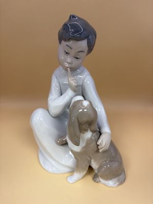 Figurine. Spain. Lladro NAO. #4522 "Boy with Dog." 8"H