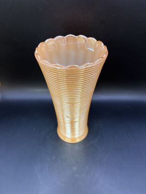 Glass. Carnival Glass. Tall Ribbed Vase with Scalloped Top Edge. Peach Color With a Pearl Luster Finish. 7.25