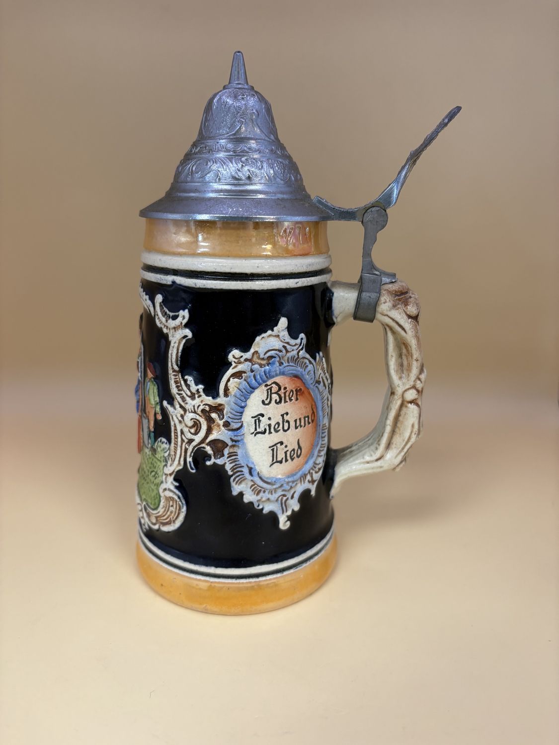 Stein. Germany. Man, Woman, &amp; Child in Field w/ Text on Sides &quot;Macht nie lebens mud!&quot; &quot;Bier Lieb und Lied.&quot; 7.25&quot;H