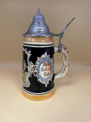 Stein. Germany. Man, Woman, &amp; Child in Field w/ Text on Sides "Macht nie lebens mud!" "Bier Lieb und Lied." 7.25"H